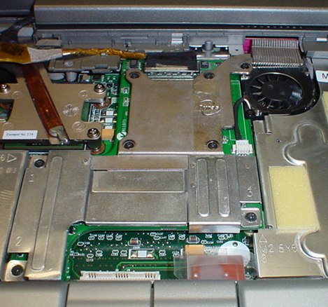 The video card is back in place. Notice the other screw by the fan that was missing at the beginning. I found it and put it back in. The video card is back in place. Notice the other screw by the fan that was missing at the beginning. I found it and put it back in.