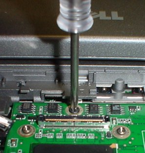 Hidden screw under the display panel plug Hidden screw under the display panel plug
